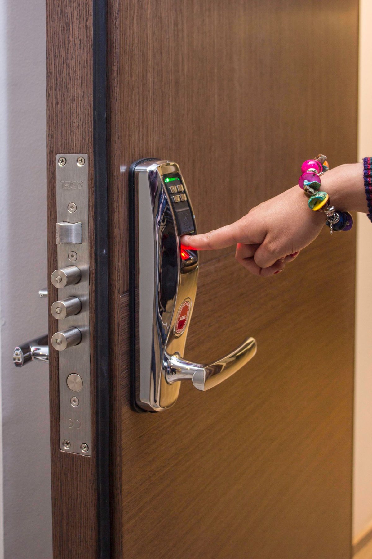Fingerprint keypad door lock being used